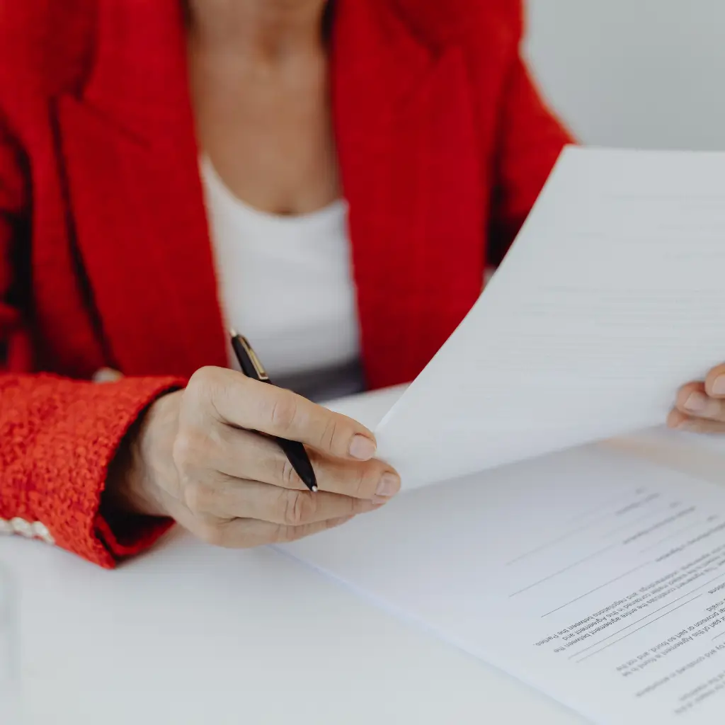 A Spanish sworn translator reviewing documents in the UK.